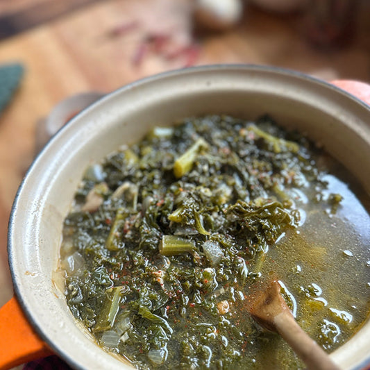 Braised greens in a pot